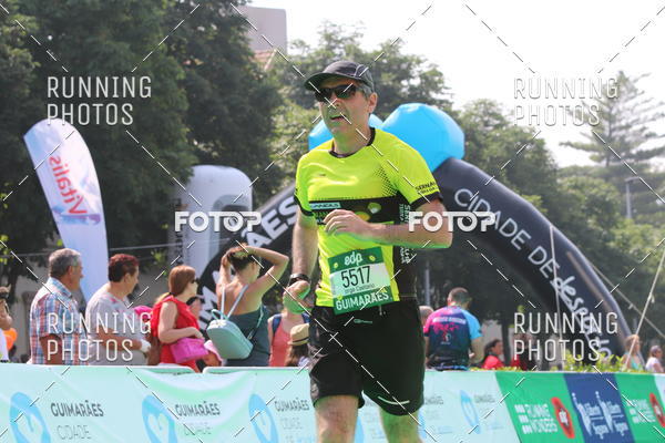 Buy your photos of the eventMeia Maratona Guimares on Fotop