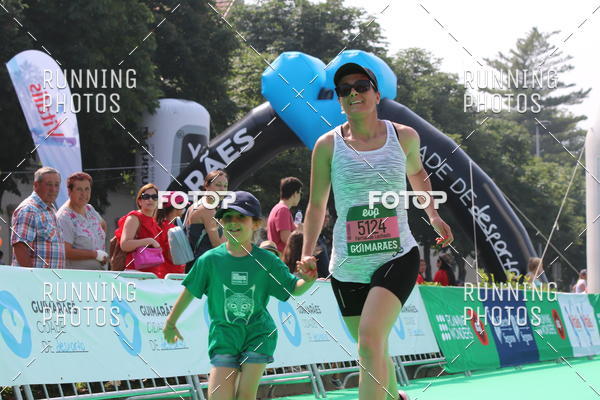 Buy your photos of the eventMeia Maratona Guimares on Fotop