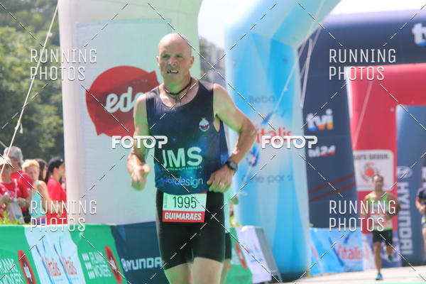 Buy your photos of the eventMeia Maratona Guimares on Fotop