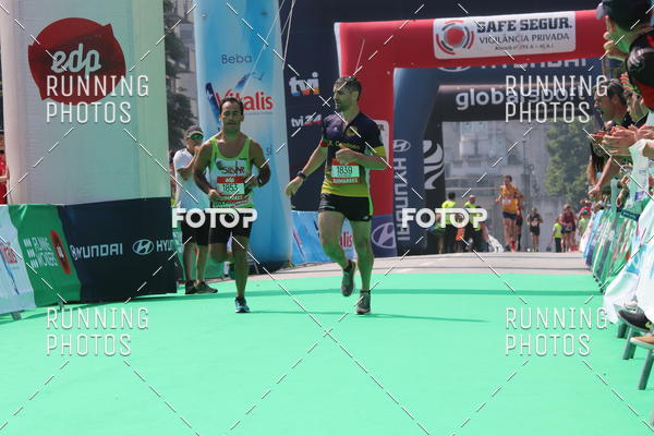 Buy your photos of the eventMeia Maratona Guimares on Fotop