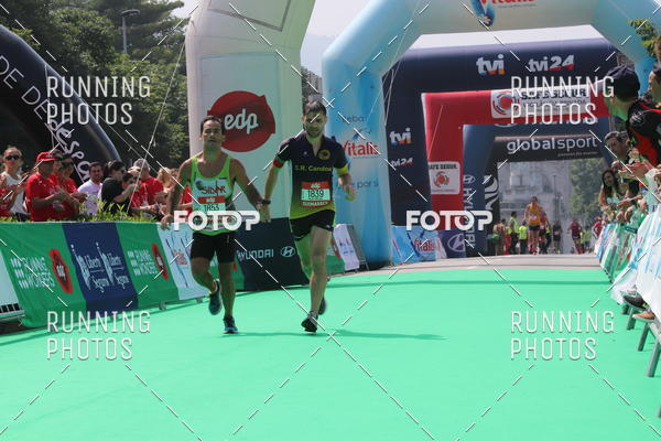 Buy your photos of the eventMeia Maratona Guimares on Fotop