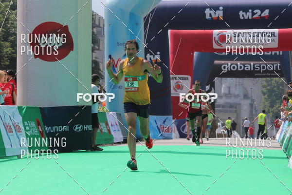 Buy your photos of the eventMeia Maratona Guimares on Fotop
