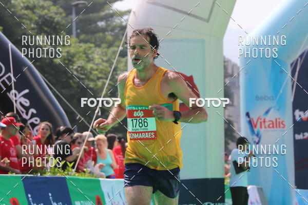 Buy your photos of the eventMeia Maratona Guimares on Fotop