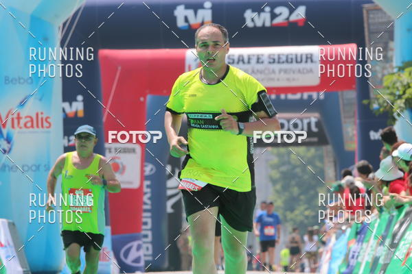 Buy your photos of the eventMeia Maratona Guimares on Fotop