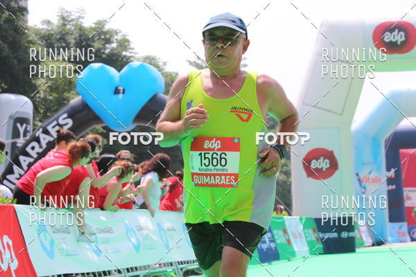Buy your photos of the eventMeia Maratona Guimares on Fotop