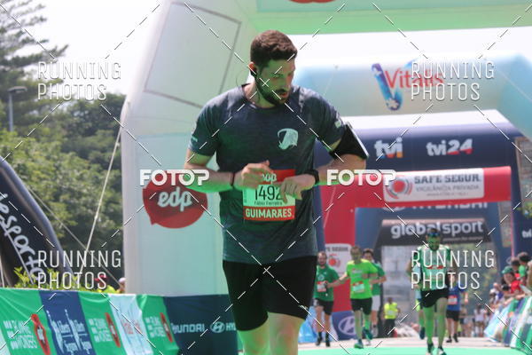 Buy your photos of the eventMeia Maratona Guimares on Fotop