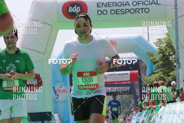 Buy your photos of the eventMeia Maratona Guimares on Fotop