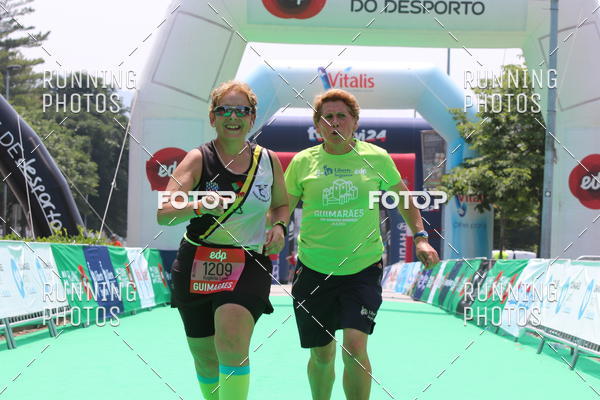 Buy your photos of the eventMeia Maratona Guimares on Fotop