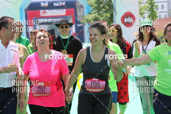 Buy your photos of the eventMeia Maratona Guimares on Fotop