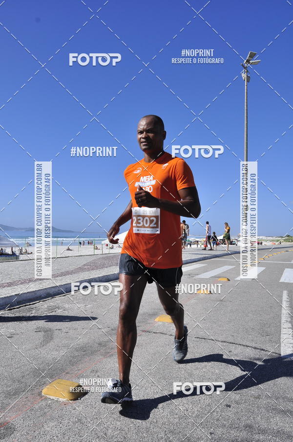 Buy your photos of the eventMEIA MARATONA DE CABO FRIO on Fotop