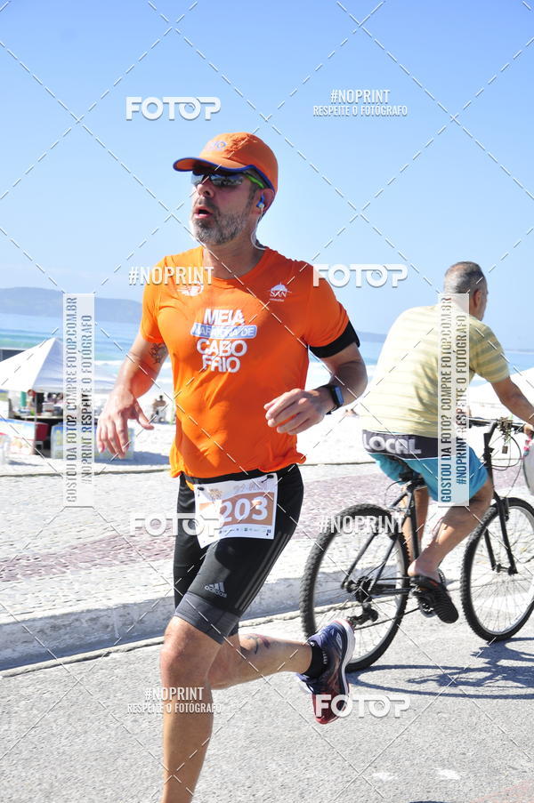 Buy your photos of the eventMEIA MARATONA DE CABO FRIO on Fotop