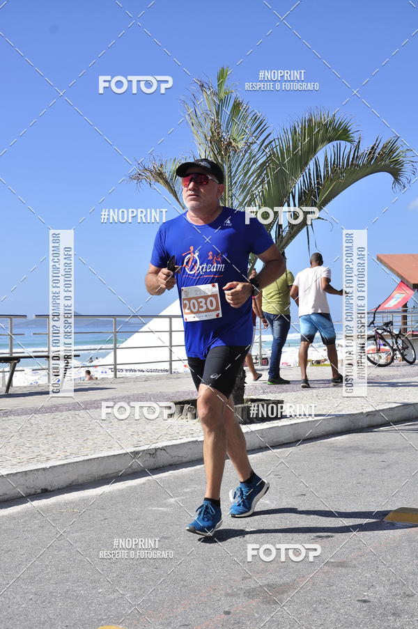 Buy your photos of the eventMEIA MARATONA DE CABO FRIO on Fotop