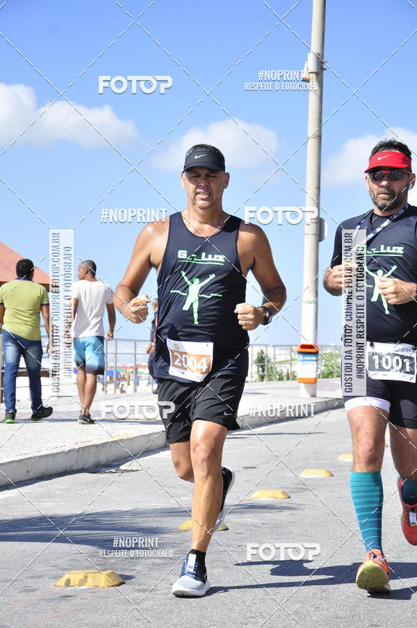 Buy your photos of the eventMEIA MARATONA DE CABO FRIO on Fotop