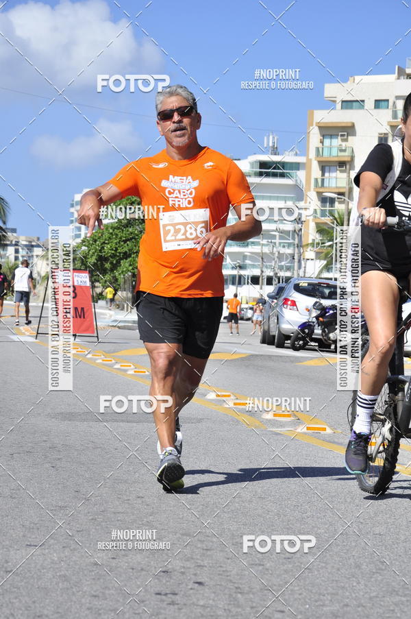 Buy your photos of the eventMEIA MARATONA DE CABO FRIO on Fotop