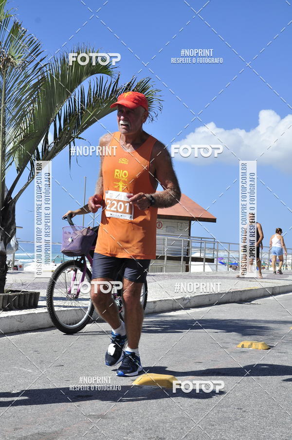 Buy your photos of the eventMEIA MARATONA DE CABO FRIO on Fotop