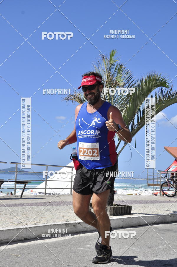 Buy your photos of the eventMEIA MARATONA DE CABO FRIO on Fotop