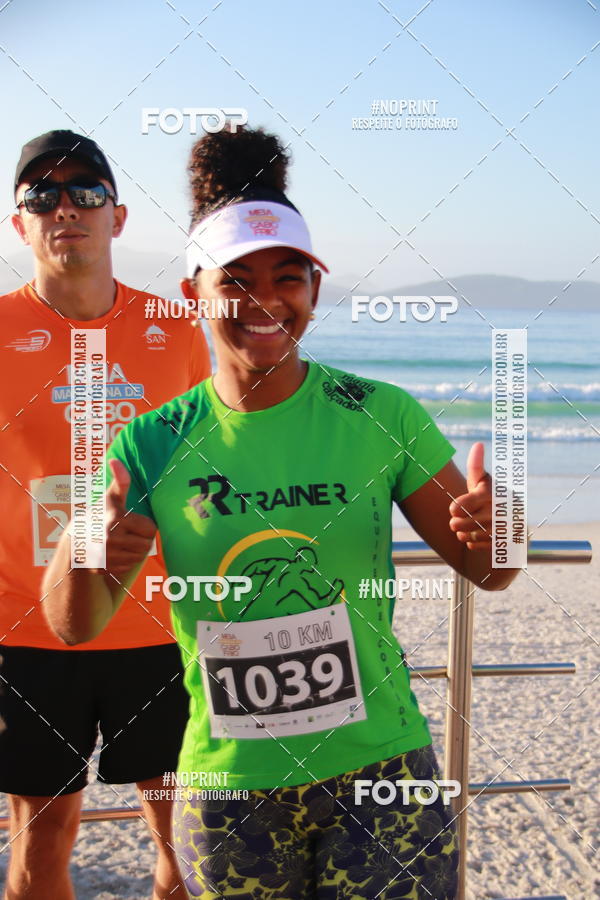Buy your photos of the eventMEIA MARATONA DE CABO FRIO on Fotop