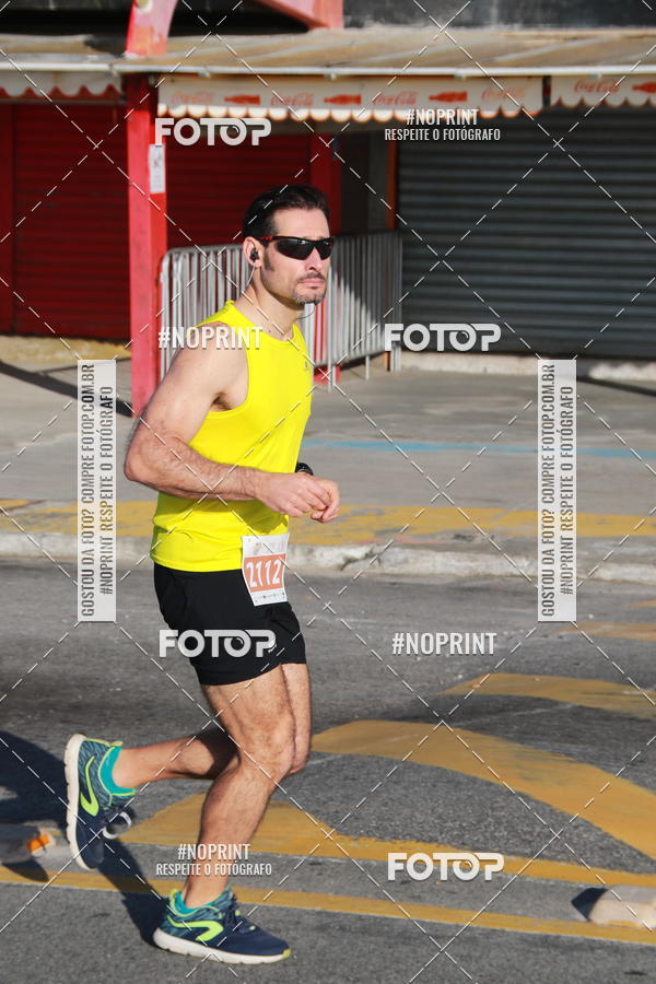Buy your photos of the eventMEIA MARATONA DE CABO FRIO on Fotop