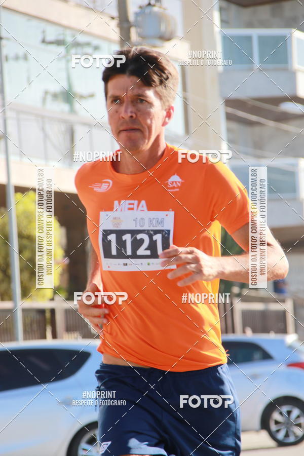 Buy your photos of the eventMEIA MARATONA DE CABO FRIO on Fotop