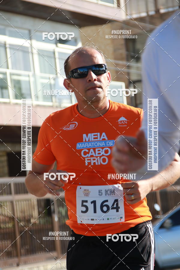 Buy your photos of the eventMEIA MARATONA DE CABO FRIO on Fotop