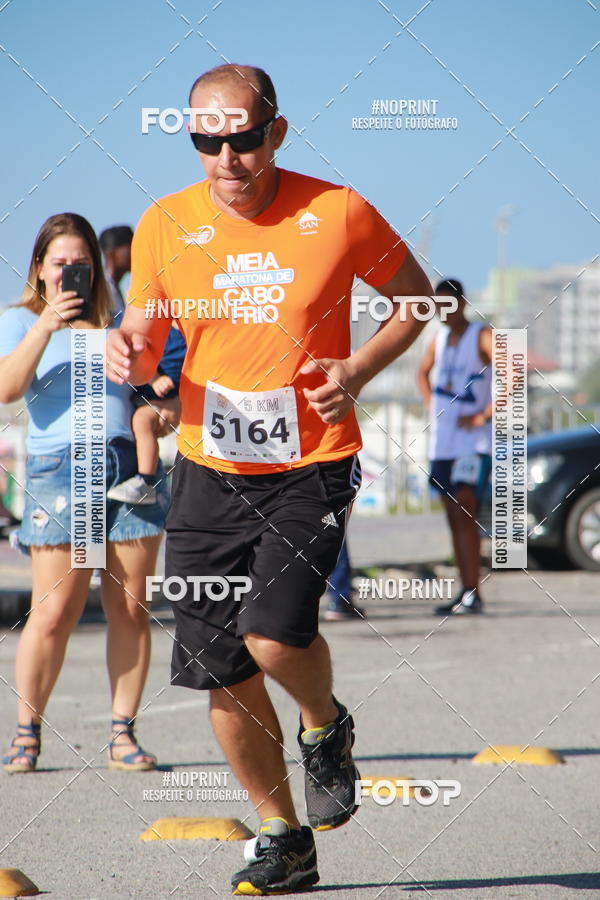 Buy your photos of the eventMEIA MARATONA DE CABO FRIO on Fotop