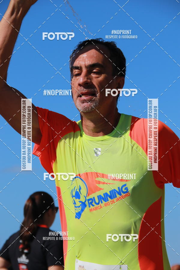 Buy your photos of the eventMEIA MARATONA DE CABO FRIO on Fotop