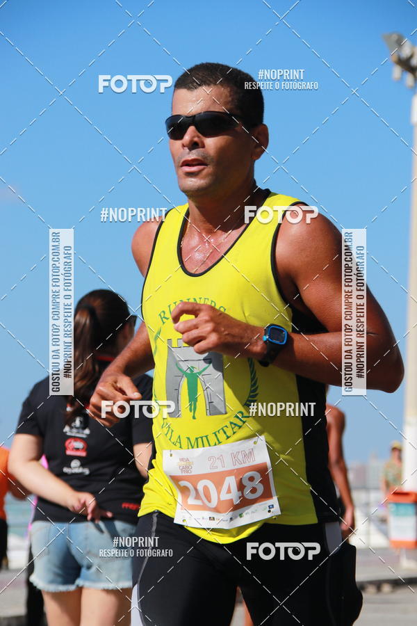 Buy your photos of the eventMEIA MARATONA DE CABO FRIO on Fotop
