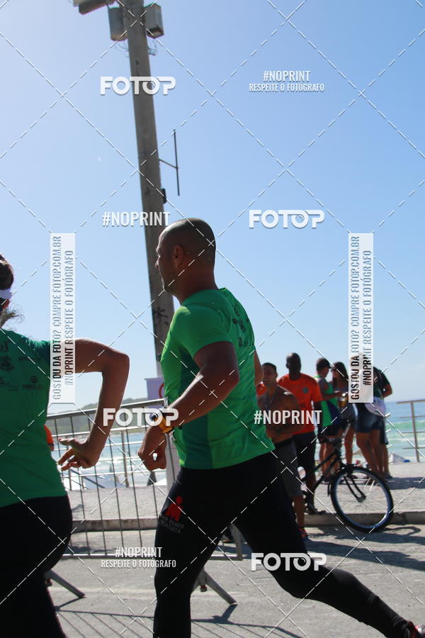 Buy your photos of the eventMEIA MARATONA DE CABO FRIO on Fotop