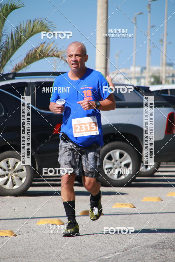 Buy your photos of the eventMEIA MARATONA DE CABO FRIO on Fotop