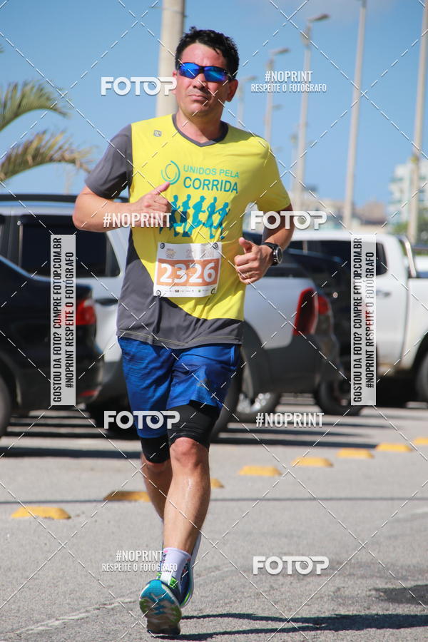 Buy your photos of the eventMEIA MARATONA DE CABO FRIO on Fotop
