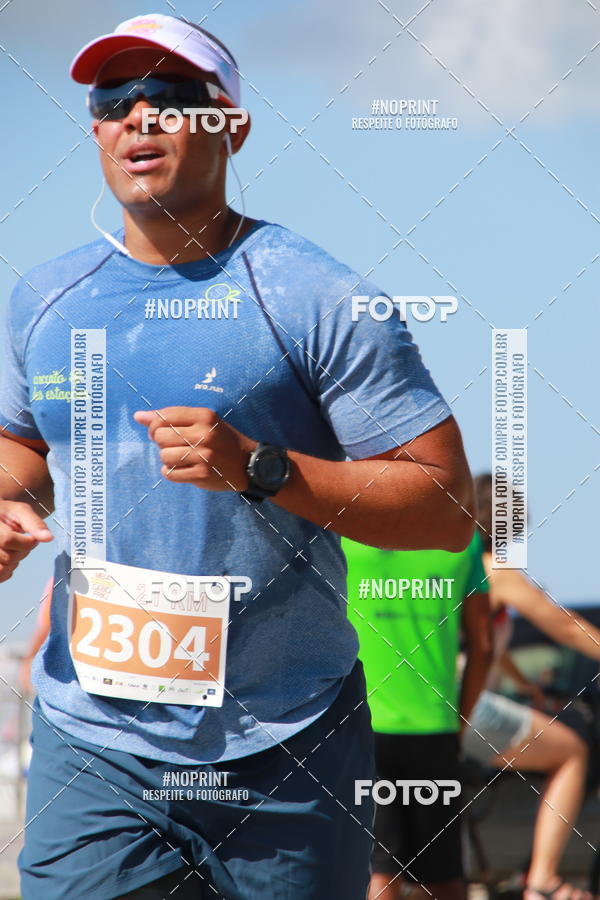 Buy your photos of the eventMEIA MARATONA DE CABO FRIO on Fotop