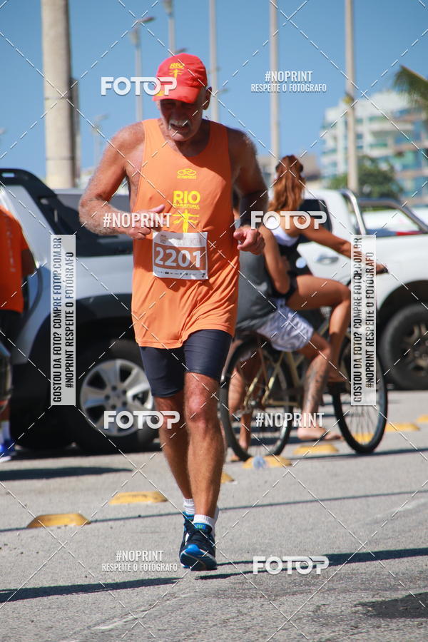 Buy your photos of the eventMEIA MARATONA DE CABO FRIO on Fotop