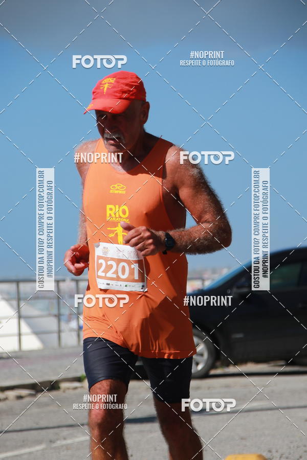 Buy your photos of the eventMEIA MARATONA DE CABO FRIO on Fotop