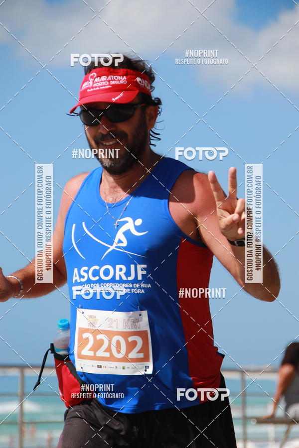 Buy your photos of the eventMEIA MARATONA DE CABO FRIO on Fotop