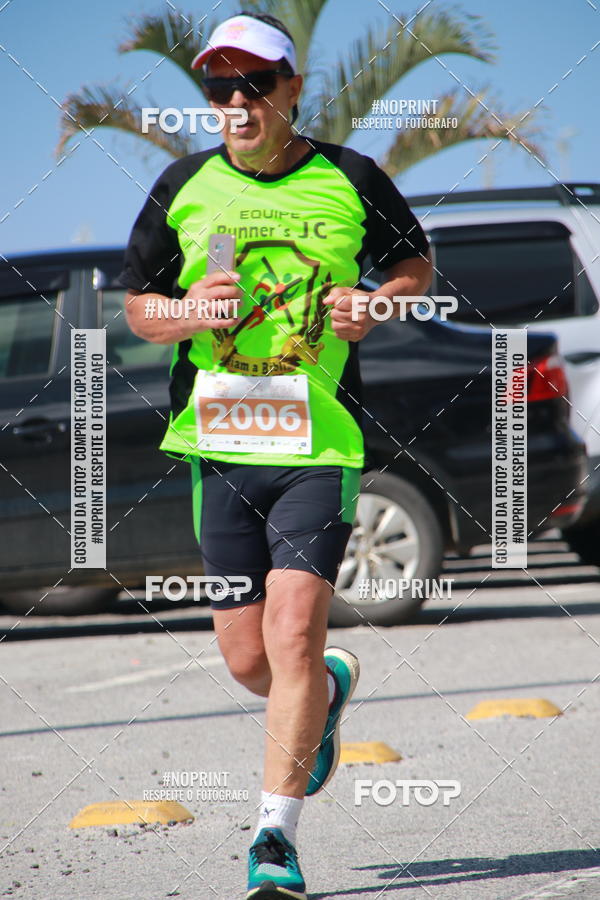 Buy your photos of the eventMEIA MARATONA DE CABO FRIO on Fotop
