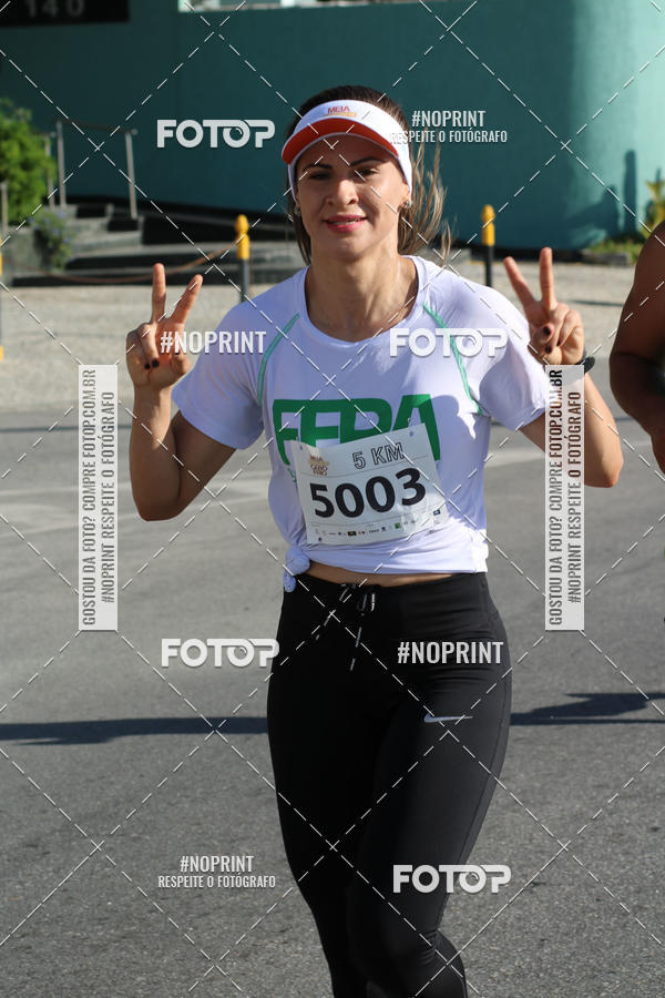 Buy your photos of the eventMEIA MARATONA DE CABO FRIO on Fotop