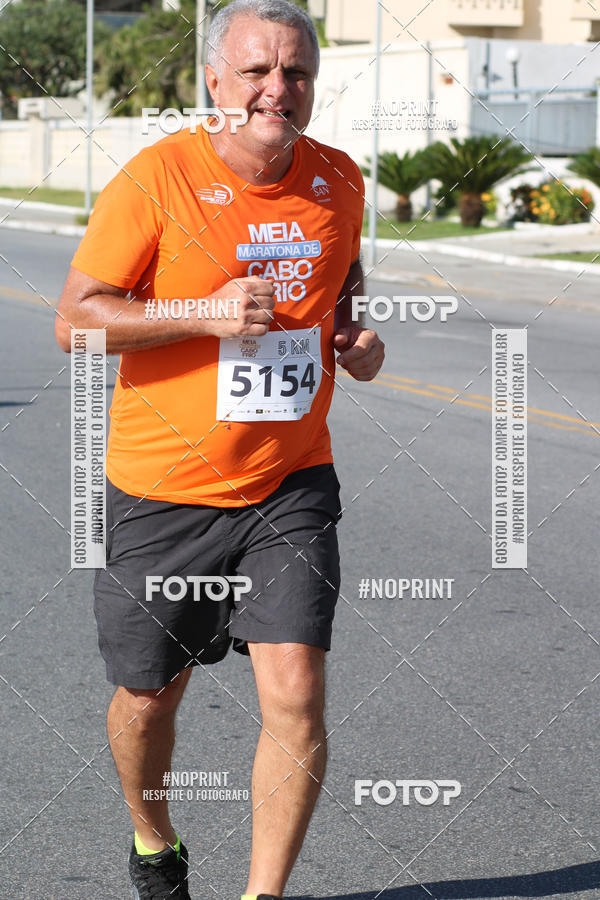 Buy your photos of the eventMEIA MARATONA DE CABO FRIO on Fotop