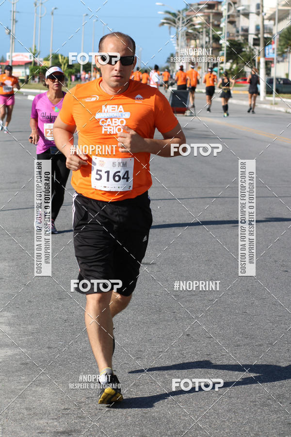 Buy your photos of the eventMEIA MARATONA DE CABO FRIO on Fotop