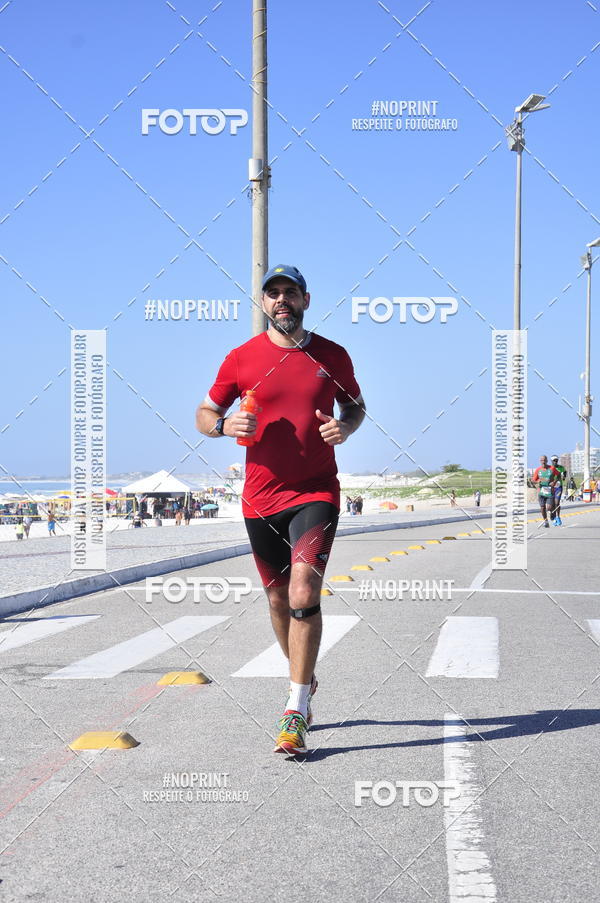 Buy your photos of the eventMEIA MARATONA DE CABO FRIO on Fotop