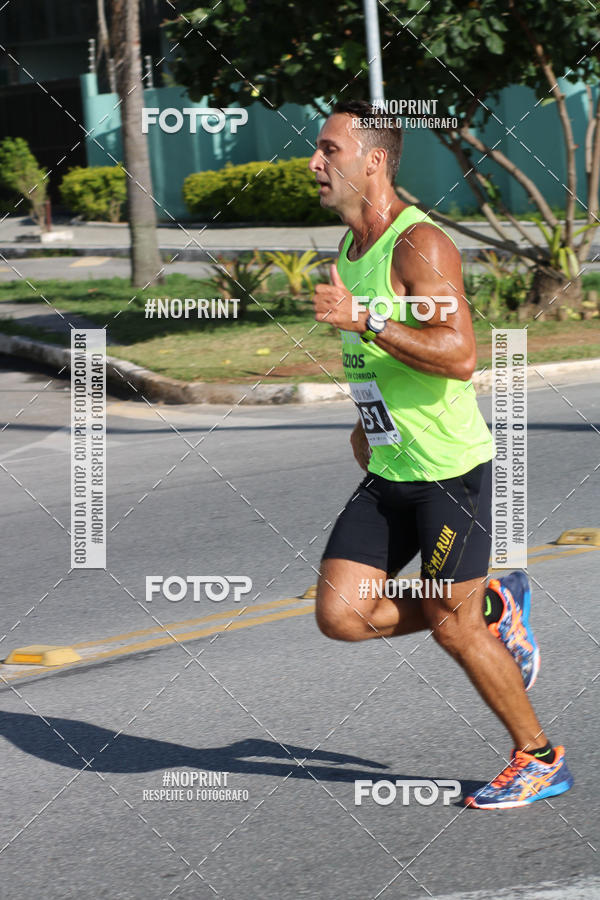 Buy your photos of the eventMEIA MARATONA DE CABO FRIO on Fotop