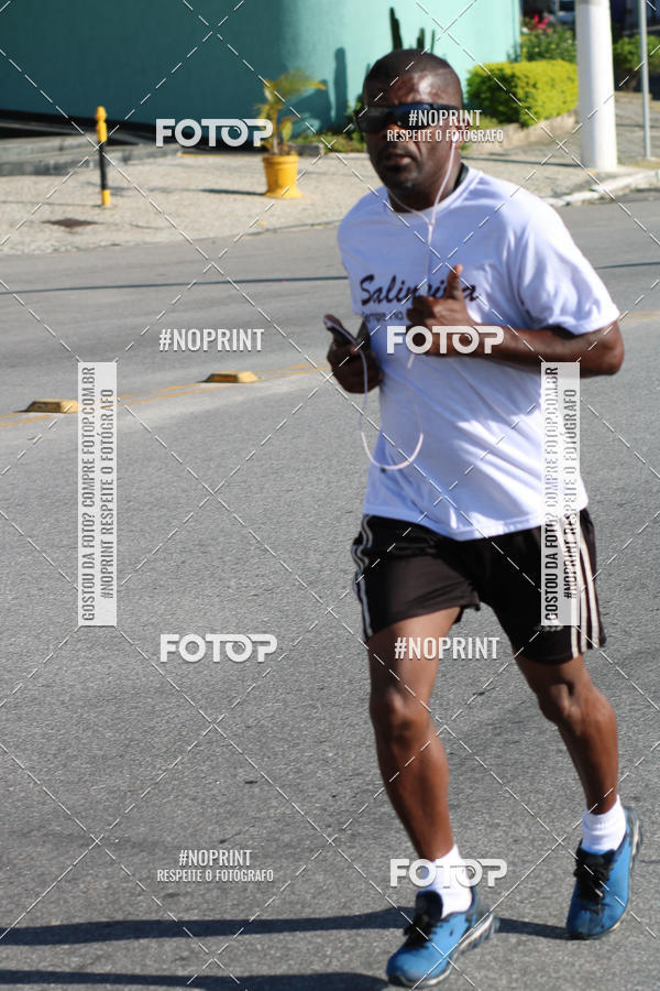 Buy your photos of the eventMEIA MARATONA DE CABO FRIO on Fotop