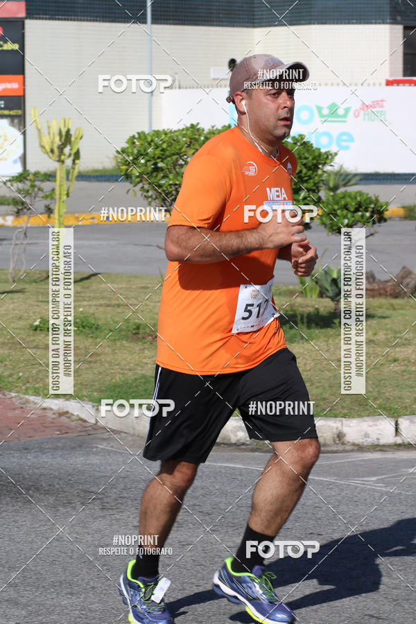 Buy your photos of the eventMEIA MARATONA DE CABO FRIO on Fotop