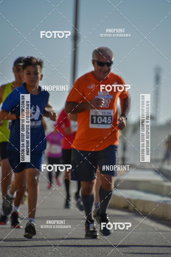 Buy your photos of the eventMEIA MARATONA DE CABO FRIO on Fotop